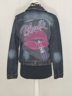 "Blondie women's upcycled denim jacket, junior's size large from Makers of the True Originals. One way or another you'll rock this upcycled Blondie jacket! Features a logo t-shirt with a fun design that has been transformed into a patch sewn on the back. Great for any fan of this new wave rock band! Size runs small. See measurements for proper fit. Bust: 38\" Armpit to Armpit: 19\" Down the back: 20\"  Shoulder seam to shoulder seam: 15\" Shoulder seam to end of cuff: 25\" Condition: Pre-owned - Upcycled Denim Jacket, Wave Rock, One Way Or Another, Pattern Dress Women, Recycle Jeans, Upcycled Denim, Mccalls Patterns, Simplicity Patterns, Rock Band