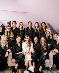 a group of women sitting next to each other