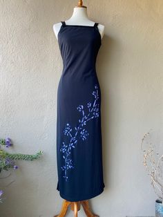 "Fun 90s cut out floral dress. Black with purple under lining and high side slits on both sides.  --- Condition: Great vintage condition  --- Size: No tag that states  Fits M best  Shown on a size small mannequin with 26\" waist and 34\" bust and fits loose.  Measurements:  --- @bluehoneyshop" 90s Cut, Star Cut Out, Small Mannequin, Types Of Colours, White Eyelet Dress, Tie Dress, Floral Dress Black, Dress Clothes For Women, Unique Vintage