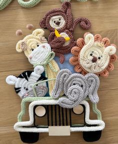 there are crocheted animals in the back of a car