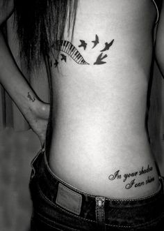 a woman's stomach with birds flying around her and the words i love you so much