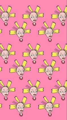 a pink background with cartoon faces and yellow hair on it's face, in the middle