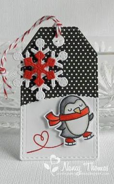 a penguin with a red scarf on it's neck