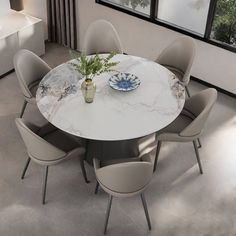 a dining table with six chairs around it