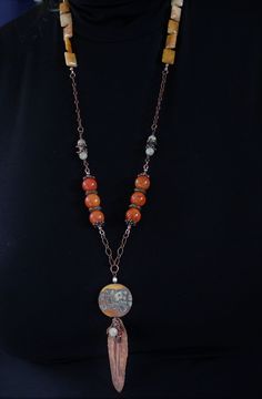 "A lovely combination of agate and quartz gemstones, antique copper chain, handmade copper components and clasp, and accented with my handmade lampwork glass beads, wire wrapped with a hand formed folded copper leaf, made by moi, and little gemstones. This super long, one of a kind lampwork necklace measures 33\" with a 5\" pendant and will arrive beautifully packaged. Sure to garner lots of compliments! To view more jewelry and handmade beads, click here... https://www.etsy.com/shop/StoneDesign Bohemian Agate Beaded Chain Necklace, Bohemian Wire Wrapped Czech Glass Beaded Necklace, Bohemian Wire Wrapped Beaded Necklaces With Czech Glass, Bohemian Czech Glass Beaded Necklace With Wire Wrap, Bohemian Czech Glass Wire Wrapped Beaded Necklace, Bohemian Beaded Necklace With Natural Stones And Copper, Bohemian Beaded Necklaces With Natural Stones And Copper, Bohemian Amber Beaded Chain Jewelry, Bohemian Amber Jewelry With Beaded Chain