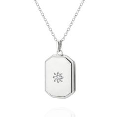 PRICES MAY VARY. Premium Quality: Crafted from genuine 925 sterling silver and plated with 14K gold, this photo locket pendant necklace is hypoallergenic and perfect for sensitive skin, ensuring comfort and durability. Unique Design: Features a distinctive rectangular coin design with a lotus motif, adding a touch of sophistication and elegance to any outfit. Functional Photo Locket: The locket opens to hold cherished photos, allowing you to keep loved ones close to your heart, making it a meani Lotus Motif, Coin Design, Locket Pendant Necklace, Photo Locket, Personalized Accessories, Locket Necklace, Locket, Womens Jewelry Necklace, Design Features