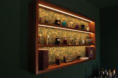 Our bespoke perfume rack offers you a customized solution that meets your customer needs. The shelf consists of a high-quality walnut veneer frame and a back panel that is covered with a stylish fabric. The fabric is additionally padded to ensure a luxurious look and feel. You have the freedom to choose from a variety of fabrics to perfectly adapt the shelf to your preferences. Please contact us to find out about the possibilities of the fabrics. The warm white LEDs, which are integrated into th Wall Perfume Display, Perfume Wall Shelf, Perfume Wall Display, Perfume Cabinet, Perfume Rack, Bedroom Wall Cabinets, Perfume Shelf, Long Floating Shelves, Perfume Storage