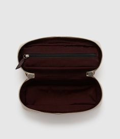 Editor's Notes:The One Day Toiletry Bag elegantly holds your daily necessities. With a waterproof cloth interior, it also features a water-resistant exterior and a zippered compartment under its lid to separate smaller items. Air Supply, Daily Necessities, Natural Linen, Toiletry Bag, Cognac, One Day, Water Resistant, Exterior, Water