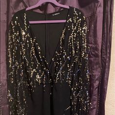 Party Sequins Jumpsuit Classy, Hot And Sexy All Wrapped Into One,With A Deep V Cut Neck Line & Gold Sequins On The Blouse Portion, Everyone Will Want To Know Your Name When You Walk Into The Room!! New Never Worn !!! 4x Fits Like A 3x Glamorous V-neck Jumpsuits And Rompers For Party, Glamorous V-neck Jumpsuit For Party, Black V-neck Jumpsuits For Party Season, Black Jumpsuits And Rompers For Party Holiday, Black Jumpsuits And Rompers For Holiday Party, Black Holiday Party Jumpsuits And Rompers, Black Jumpsuit For Holiday Party, Black Sequined Jumpsuit For Party, Black Jumpsuit For Party Season