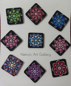 there are nine different designs on the black square magnets, each decorated with colorful beads