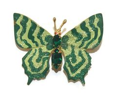 Vintage gold tone, green rhinestones and shades of green enamel butterfly brooch. Some wear. Prefect brooch for spring time! DETAILS: ☼ Approximately 1 3/8 by 1 5/8 inches. ☼ Approximately 7.1 grams, total weight. ☼ ☼ ☼ ☼ ☼ ☼ ☼ ☼ ☼ ☼ ☼ ☼ ☼ ☼ ☼ ☼ ☼ ☼ ☼ ☼ ☼ PLEASE NOTE: ☼ Different items on SALE everyday! Check back often to take advantage of these bargains! ☼ FREE DOMESTIC SHIPPING on purchases of $35 or more. Combined shipping is still available to domestic and international locations. ☼ This sh Green Butterfly Brooch Jewelry, Enamel Butterfly, Palm Coast, Butterfly Brooch, Green Enamel, Rose Earrings, Flower Brooch, Shades Of Green, Rose Flower