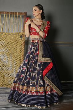 Midnight blue pure silk woven patola lehenga. Comes with ruby red blouse in puff sleeved hand embroidered details and organza laced dupatta paired with semi-precious jewelled kamarbandh with tassels.
Components:4
Pattern:Embroidered
Type of Work:Resham, Zardozi, Mirror and Gota
Neckline:Square
Sleeve Length:Puff Sleeves
Fabric:Lehenga and Blouse: Pure Silk Banarasi; Dupatta: Organza
Color:Blue
Other Details:
Cutwork hem neckline
Patola motifs
Tassel hem belt
Note: The potli bag shown in the imag Patola Motifs, Patola Lehenga, Aditi Gupta, Lehenga And Blouse, Banarasi Dupatta, Potli Bag, Blue Lehenga, Lehenga Blouse, Red Blouse