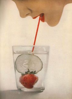 Harper’s Bazaar 1953    The champagne fruit glass by Steuben in a life-sized, shining crystal of gigantic measure. Lucien Lelong’s ‘Okatea Red’ lipstick. Richard Avedon Photography, Lucien Lelong, America Images, Richard Avedon, Foto Art, Harper’s Bazaar, Harpers Bazaar, Food Styling, Portrait Photographers