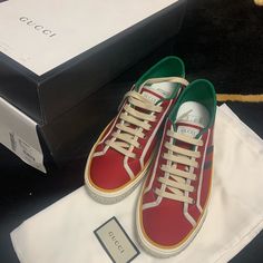 Gucci Mens Red Tennis 1977 Sneaker 606111 Condition Is Brand New With Box Dust Bags And Extra Laces. Come With Dust Bags And Auth Card 100% Authentic And Will Be Shipped Red High-top Sneakers With Embroidered Logo, Gucci Leather High-top Sneakers With Embroidered Logo, Red Casual Sneakers With Embroidered Logo, Casual Red Sneakers With Embroidered Logo, Gucci High-top Sneakers With Red Sole, Casual Gucci Leather Sneakers, Gucci Casual High-top Sneakers With Branded Heel Counter, Gucci Leather Sneakers With Red Sole, Gucci Red High-top Sneakers