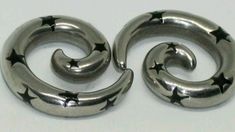 two metal rings with stars on them