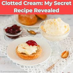 two small desserts with whipped cream and cranberry sauce on them, sitting on a white doily