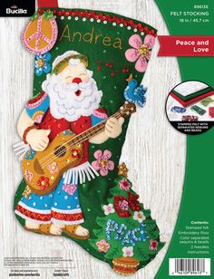 a christmas stocking with an image of santa playing the guitar