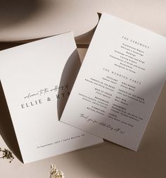 two wedding programs laying on top of each other next to a bouquet of dried flowers