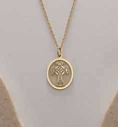 Gold Celtic Cross  Pendant - Celtic Cross Gold Necklace ● Material of pendant: Solid Gold 14k ( REAL GOLD ) ● Metal Stamp: 14k ( REAL GOLD ) ● The pendant is available in 5 sizes: - 12x17 mm / 0,47 x 0,66 inches - 13x18 mm / 0,51 x 0,70 inches  In the photos - 14x19 mm / 0,55 x 0,74 inches  - 16x21 mm / 0,62 x 0,82 inches  - 18x24 mm / 0,70 x 0,94 inches ( In the photos the size is 13x18 mm / 0,51 x 0,70 inches ) ( Jump Ring inner diameter: 4 mm ) ● Material of chain: Solid gold 14k ( REAL GOLD ) It is thin and dainty and it is available in 4 sizes: - 40 cm / 15,75 inches ( Length ) - 45 cm / 17,72 inches ( Length ) In the photos - 50 cm / 19,68 inches ( Length ) - 55 cm / 21,65 inches ( Length ) ● Backside engraving is FREE ( Please use the personalization box for that.) ● If you want lar 14k Gold Cross Necklace Tarnish Resistant, Hallmarked Yellow Gold Cross Pendant Jewelry, Gold Hallmark Pendant Jewelry, Yellow Gold Cross Necklace Tarnish Resistant, Oval Hallmarked Gold Jewelry, Yellow Gold Oval Pendant Necklace Stamped 14k, 14k Stamped Yellow Gold Oval Necklace, Oval Gold Hallmarked Jewelry, Oval Gold Jewelry Hallmarked