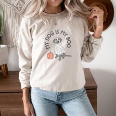 This 'My Dog Is My Boo' sweatshirt is a cute and perfect choice for Fall. The cozy feel of the medium-heavy fabric blend of cotton and polyester, along with the classic fit and crew neckline, makes it ideal for colder months. With top-tier durability and a tear-away label for itch-free comfort, this sweatshirt is a must-have for anyone looking for a stylish and comfortable Fall shirt. Product features - Knit in one piece without side seams - Ribbed knit collar with seam for elasticity - Medium-heavy fabric blend for cozy feel - Double-needle stitching for durability - Ethically and sustainably produced Care instructions - Machine wash: cold (max 30C or 90F) - Non-chlorine: bleach as needed - Tumble dry: low heat - Do not iron - Do not dryclean Fall Long Sleeve Tops With Dog Print, Fall Cotton Sweatshirt With Dog Print, Cotton Dog Print Sweatshirt For Fall, Long Sleeve Dog Print T-shirt For Fall, Boo Sweatshirt, Halloween Plus Size, Plus Size Sweatshirt, Plus Size Shirt, My Boo