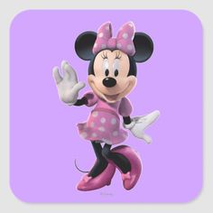 a cartoon minnie mouse with pink and white polka dots on it's head, waving