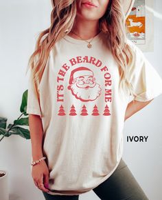 Christmas Shirts for Women, Love a Man with A Beard, Comfort Colors®, Retro Santa Tee, Funny Christmas Shirt, Holiday TShirt SIZE UP for an OVERSIZED FIT (see size chart in listing photos). Looking for more Christmas and Winter themed apparel? Check these out: https://www.etsy.com/shop/TheGraphicPeach?ref=seller-platform-mcnav§ion_id=30496778 Our shop uses direct-to-garment printing to make our products. The design ink is sprayed on, then allowed to soak into the fibers of the garment. This proc Funny Santa Shirts, Vintage Christmas Shirt, Santa Tee, Retro Santa, Boho Tees, Santa Shirt, Womens Christmas Shirts, Comfort Colors Tshirt, Funny Santa