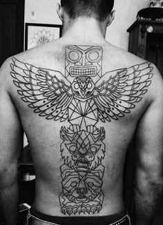 a man with an owl tattoo on his back