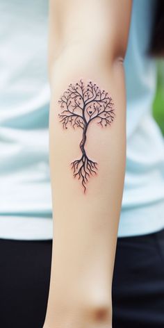 Exquisite small tree hand tattoo, designed in a minimalistic aesthetic to represent a woman's strength and her deep bond with nature. Ideal for women seeking a unique, nature-inspired hand tattoo. Graceful Tattoos For Women, Tree Tattoo On Arm, Growth And Healing Tattoo, Rooted Tree Tattoo, Small Tattoos Tree Of Life, Keep Growing Tattoo, Small Tree Of Life Tattoo For Women, Resilient Tattoos For Women, Tattoos That Symbolize Growth