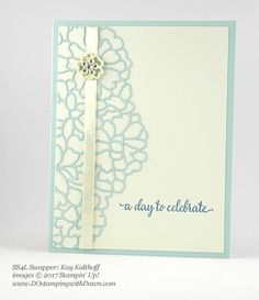 a close up of a card with a ribbon on it