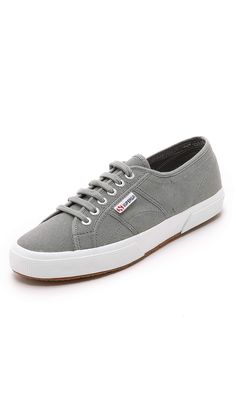 PRICES MAY VARY. Fully breathable pure cotton Style may feature 5 or 6 eyelets Sneaker featuring lace-up vamp with silver-tone rivets and wrap-around outsole Logo tag at side;Vulcanised gum sole Superga sneakers tend to run slightly large. We recommend sizing down by 1/2 size. Fit tip-we recommend a whole size down from the size you usually take Gray Lace-up Canvas Shoes With Rubber Sole, High-top Sneakers With Front Lace-up Fastening For Spring, High-top Sneakers With Front Lace-up For Spring, Spring High-top Sneakers With Lace-up Fastening, Spring High-top Sneakers With Front Lace-up Fastening, Gray Sneakers With Vulcanized Sole For Spring, Spring Sneakers With Round Toe, Spring Streetwear Sneakers With Front Lace-up Fastening, Gray Low-top Canvas Shoes For Spring