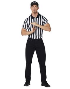 a man wearing a referee's uniform standing with his hands folded in front of him