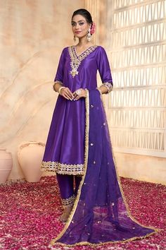 Blue anarkali in dupion base with floral pattern gota embroidered yoke, cuffs, hem and fringed lace details. Comes with matching dupion salwar and dupatta. - Aza Fashions Elegant Purple Salwar Kameez With Gota Work, Elegant Purple Anarkali Set With Gota Work, Reception Chanderi Salwar Kameez With Dori Work, Chanderi Salwar Kameez With Dori Work For Reception, Purple Chanderi Anarkali Set For Reception, Elegant Slub Silk Churidar With Dori Work, Elegant Churidar With Dori Work In Slub Silk, Slub Silk Salwar Kameez With Dori Work For Eid, Eid Salwar Kameez With Dori Work In Slub Silk