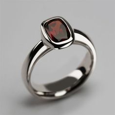 "Product description: Product Type - Ring Metal Type - 925 Sterling Silver (High Quality Polishing & Finishing) Gemstone - Natural Garnet Gemstone Size - 8X6 MM Gemstones Shape - Cushion Accent Stone - None Gemstone color - As Picture Gemstone Purity - 100% Natural (Guaranteed) Standard Shipping - 3 to 7 Days ($25 Extra) Economy Shipping - 10 to 20 Days (Free Worldwide) Please Note - Color in the picture may be slightly different from the actual product. Due to photographic light conditions. Classic White Gold Birthstone Ring With Polished Finish, Formal White Gold Ruby Ring With Polished Finish, Formal White Gold Birthstone Ring With Polished Finish, Classic Solitaire Gemstones For Formal Occasions, Classic Ruby Ring With Polished Round Stone, Classic White Gold Ruby Ring With Polished Finish, Formal Ruby Ring With Round Stone In White Gold, Modern Ruby Ring For Formal Occasions, Formal White Gold Ruby Ring With Round Stone