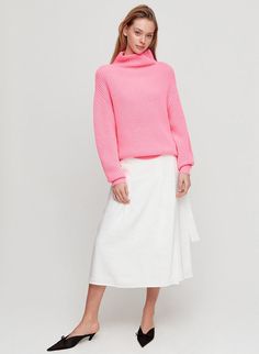 Wilfred MONTPELLIER SWEATER | Aritzia  Pair a bright pink turtleneck with a winter white skirt for a brighter end to winter outfits. #pink #turtleneck #sweaters #white Spring Turtleneck Sweater, Spring Long Sleeve Chunky Knit Turtleneck, Spring Chunky Knit Long Sleeve Turtleneck, Spring Soft Knit Turtleneck Sweater, Spring Turtleneck With Ribbed Cuffs, Soft Knit Turtleneck Sweater For Spring, Oversized Fine Knit High Neck Sweater, Oversized High Neck Fine Knit Sweater, Spring Oversized Turtleneck