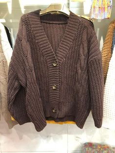 RM55387901816053 The Autumn 2020 Casual Long Sleeve Knitted Sweater is the perfect top for the cold weathers, to keep you all cozy and warm. The sweater is available in 6 different shades: purple, beige, coffee, black, blue, and yellow. It comes in one size that fits all. Pair it up with your favorite pair of jeans and boots, and you will have a great outfit. So go hurry up and add this sweater to your cart right now! Decoration: Buttons Neckline: V-neck Sleeve Length: Full-sleeves Season: Autum Solid Color Chunky Knit Winter Sweater, Solid Color Chunky Knit Sweater For Winter, Chunky Knit Solid Sweater For Winter, Solid Chunky Knit Sweater For Winter, Solid Acrylic Sweater Coat For Fall, Fall Acrylic Solid Color Sweater Coat, Trendy Warm Solid Sweater, Trendy Warm Solid Color Sweater, Trendy Solid Warm Sweater