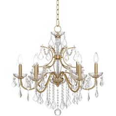 a gold chandelier with crystal drops hanging from it's center and sides