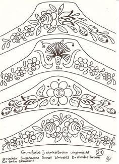 an intricately designed piece of art with flowers and leaves in black ink on white paper