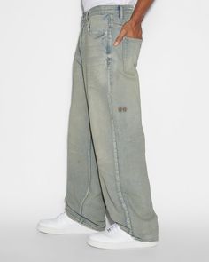 Distressed Rigid Denim Jeans For Streetwear, Distressed Medium Wash Flare Jeans For Streetwear, Distressed Straight Leg Jeans For Streetwear, Baggy Washed Jeans For Streetwear, Baggy Distressed Rigid Denim Jeans, Distressed Denim Cargo Jeans For Streetwear, Baggy Distressed Jeans In Rigid Denim, Urban Style Distressed Denim Blue Flare Jeans, Urban Denim Blue Distressed Flare Jeans