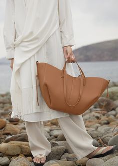 [vc_row][vc_column width=”1/3″][vc_column_text text_larger=”no”] Polene Polene Cyme Edition Textured Camel Cyme Edition Textured Camel This sculptured tote bag featuring waves, folds, Karl Lagerfeld Bag, Polene Bag, Cowhide Handbags, Bucket Tote, Bucket Handbags, Leather Bag Women, Guangzhou, Leather Tote Bag, Fashion Handbags