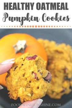 a hand holding a pumpkin cookie in front of an orange and text overlay reads healthy oatmeal pumpkin cookies