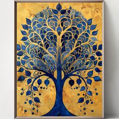 a blue and yellow tree with leaves on it