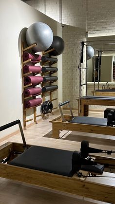 an exercise room with piyos and yoga mats