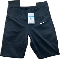 Nike Tight Moisture-wicking Bottoms, Nike Tight Workout Bottoms, Tight Nike Sports Bottoms, Nike Fitted Moisture-wicking Leggings, Nike Tight Sports Bottoms, Fitted Nike Leggings With Moisture-wicking, Nike Sports Bottoms, Fitted, Nike Fitted Sportswear Bottoms, Nike Moisture-wicking Leggings