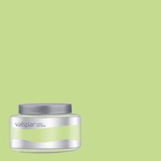 a jar of cream on a green background with the word vallsparre written below it