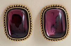 "Y.S.L. Gold Plated Purple Glass clip - on earrings. Excellent condition  wt.: 30.7 grams size 1 3/8\" x 1\"  marked: copyright symbol YSL  08/08/23 1403" Designer Metal Clip-on Earrings For Formal Occasions, Elegant Purple Clip-on Earrings For Formal Occasions, Classic Cabochon Clip-on Earrings For Formal Events, Luxury Metal Clip-on Earrings For Formal Occasions, Classic Formal Clip-on Earrings With Cabochon, Elegant Rectangular Clip-on Earrings For Formal Events, Classic Formal Clip-on Cabochon Earrings, Formal Metal Clip-on Earrings, Purple Clip-on Earrings For Formal Occasions