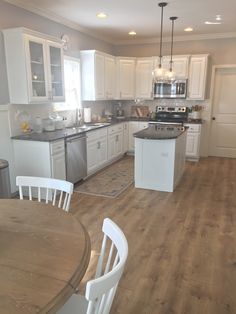 the kitchen is clean and ready to be used for cooking or dining room furniture,