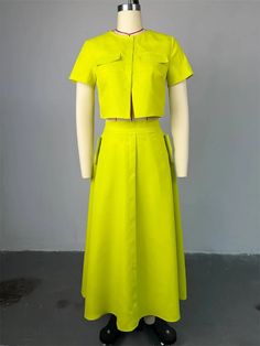 This two piece set for women is perfect for summer holidays, featuring a loose silhouette and ankle-length dresses. The main fabric is a polyester and cotton blend from Guangdong, China. With a comfortable elastic waist and no closure, this set is both stylish and easy to wear. The fabric content is between 91% - 95% and there are no decorative elements. The design is simple yet fashionable, making it a great choice for casual wear. Released for summer 2024, this set is expertly crafted with TAT Middle Aged Women, Guangdong China, Ankle Length Dress, Half Skirt, Woman Silhouette, Summer Holidays, Decorative Elements, Summer Fabrics, Solid Clothes