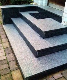 the steps are made out of concrete and have been placed on top of each other