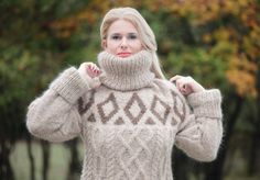 Thick Icelandic wool sweater with Cables and Fair Isle pattern Materials : 100 % Icelandic wool Designed and crafted by Tangles Color : Beige/Dark brown Weight: 1.200 kg Measurements : Sizes S, M, L XL, XXL Body length: Chest width: Sleeve measured from the neckline to the end of the cuff: Neck unrolled: 14 ''/ 35 cm All the measurements are taken with the item flat and not stretched Please check carefully the described measurements before you decide to purchase this item! Please consider that t Nordic Mohair Sweater For Fall, Beige Alpaca Long Sleeve Sweater, Beige Long Sleeve Alpaca Sweater, Beige Knitted Turtleneck Sweater, Cream Long Sleeve Alpaca Sweater, Nordic Long Sleeve Knitting Pattern For Fall, Thick Turtleneck, Icelandic Wool Sweaters, Fair Isle Pullover