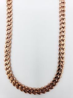 Handcrafted with precise detail, high quality, Diamond Miami Cuban Chain. -9.25 Ct, 16 Inches, 7 MM, 52.1 Grams -14K Rose Gold Rose Gold Link Jewelry With Curb Chain, Rose Gold Jewelry With Curb Chain And Oval Link, Rose Gold Cuban Link Chain Necklace Gift, Rose Gold Chain Necklace As Gift, Rose Gold Curb Chain Necklace, Luxury Rose Gold Cuban Link Chain Necklace, Rose Gold Cuban Link Necklace With Curb Chain, Rose Gold Cuban Link Chain Necklace, Rose Gold Cuban Link Chain Necklaces